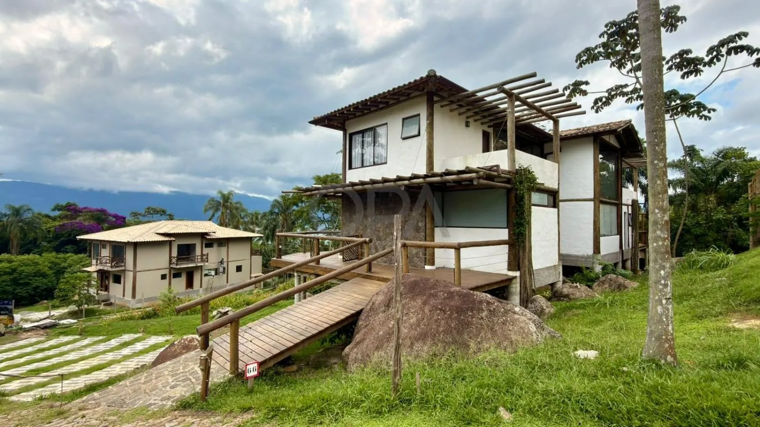 Casa com 4 suítes, piscina e integração total com a natureza em condomínio no sul de Ilhabela/SP — foto 2